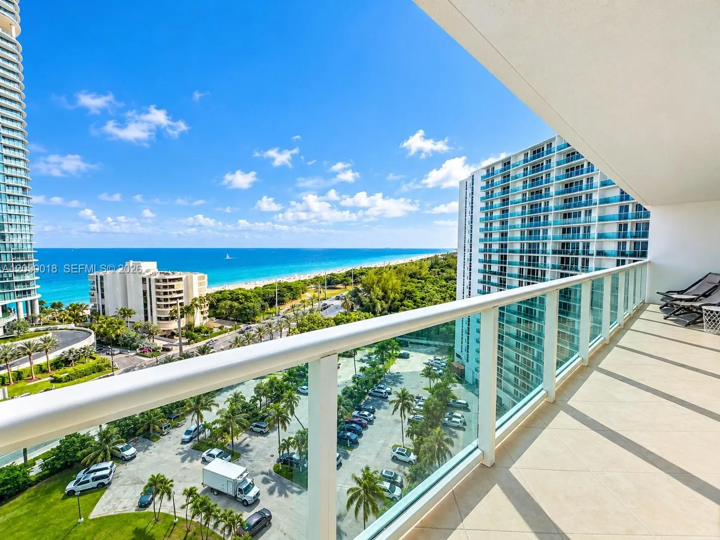 Expansive private balcony with stunning ocean and water views.