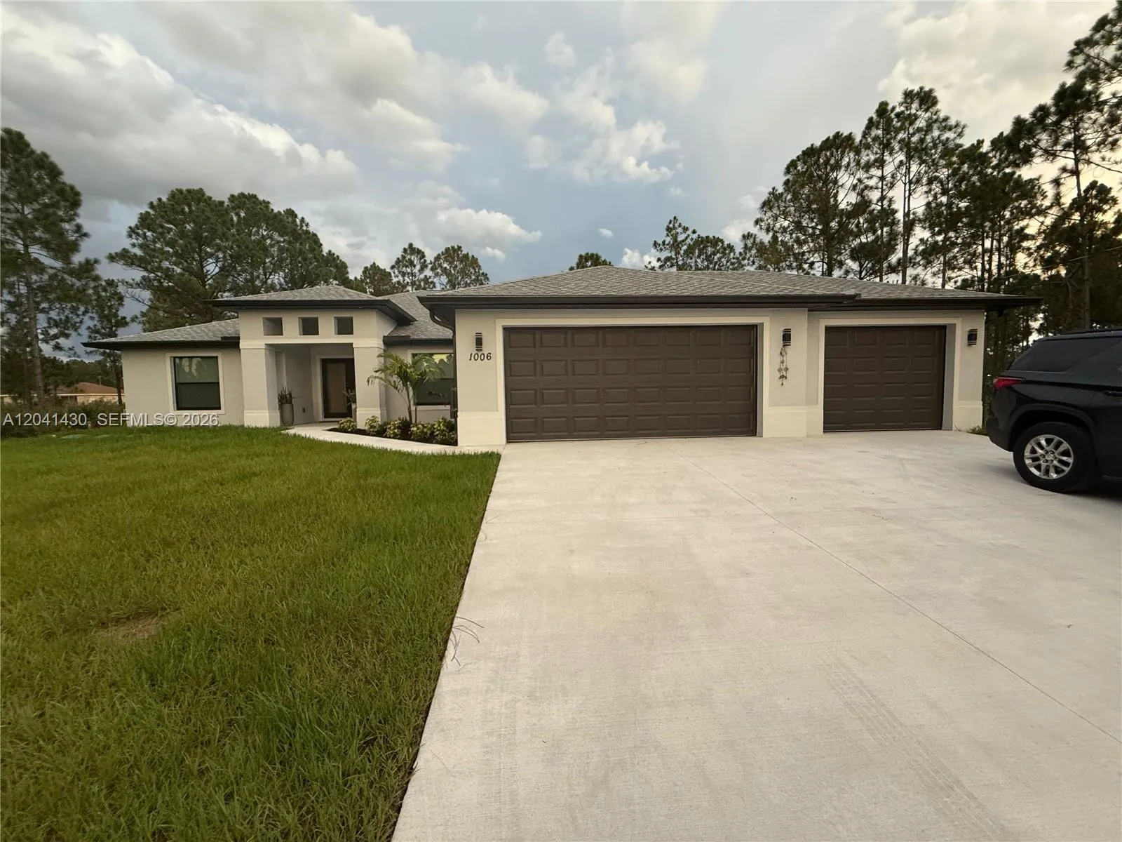 Foto de propiedad en 1006 Rush Avenue, Lehigh Acres, FL 33972 Lehigh Acres con MLS# 