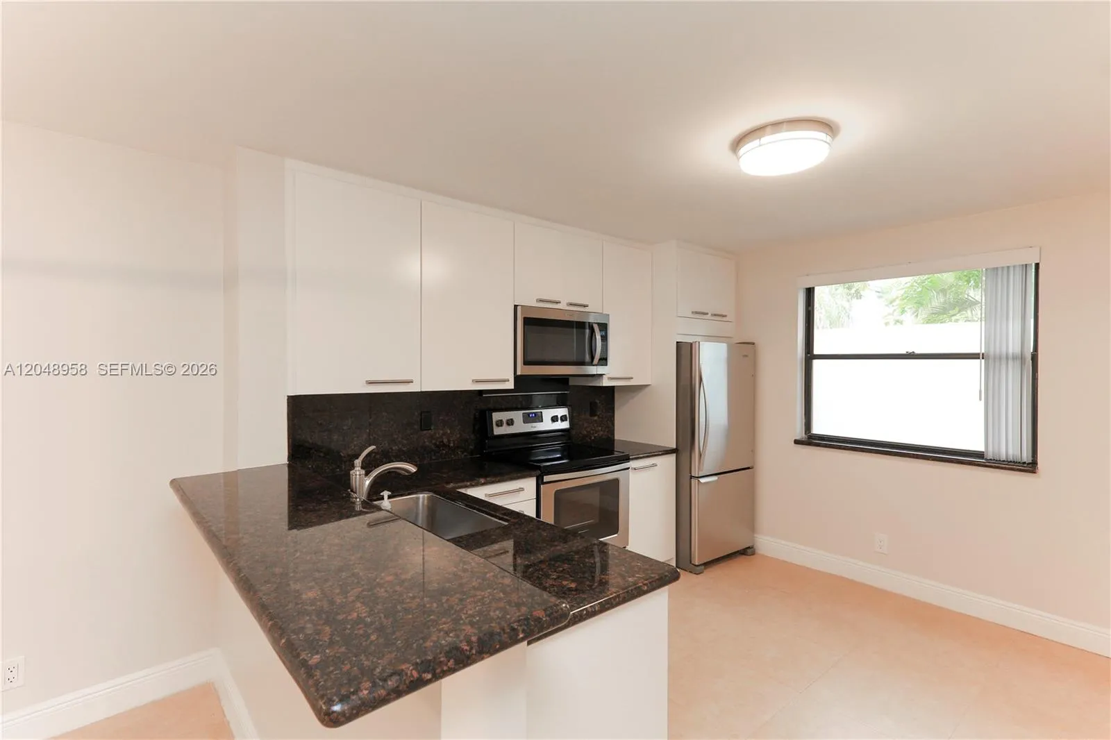 Foto de propiedad en 10125 W Sunrise Boulevard 101, Plantation, FL 33322 Plantation con MLS# 
