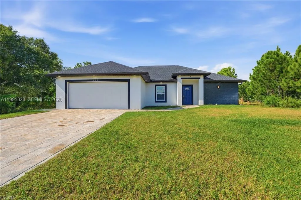 Foto de propiedad en 1013 Atherton Avenue, Lehigh Acres, FL 33971 Lehigh Acres con MLS# 
