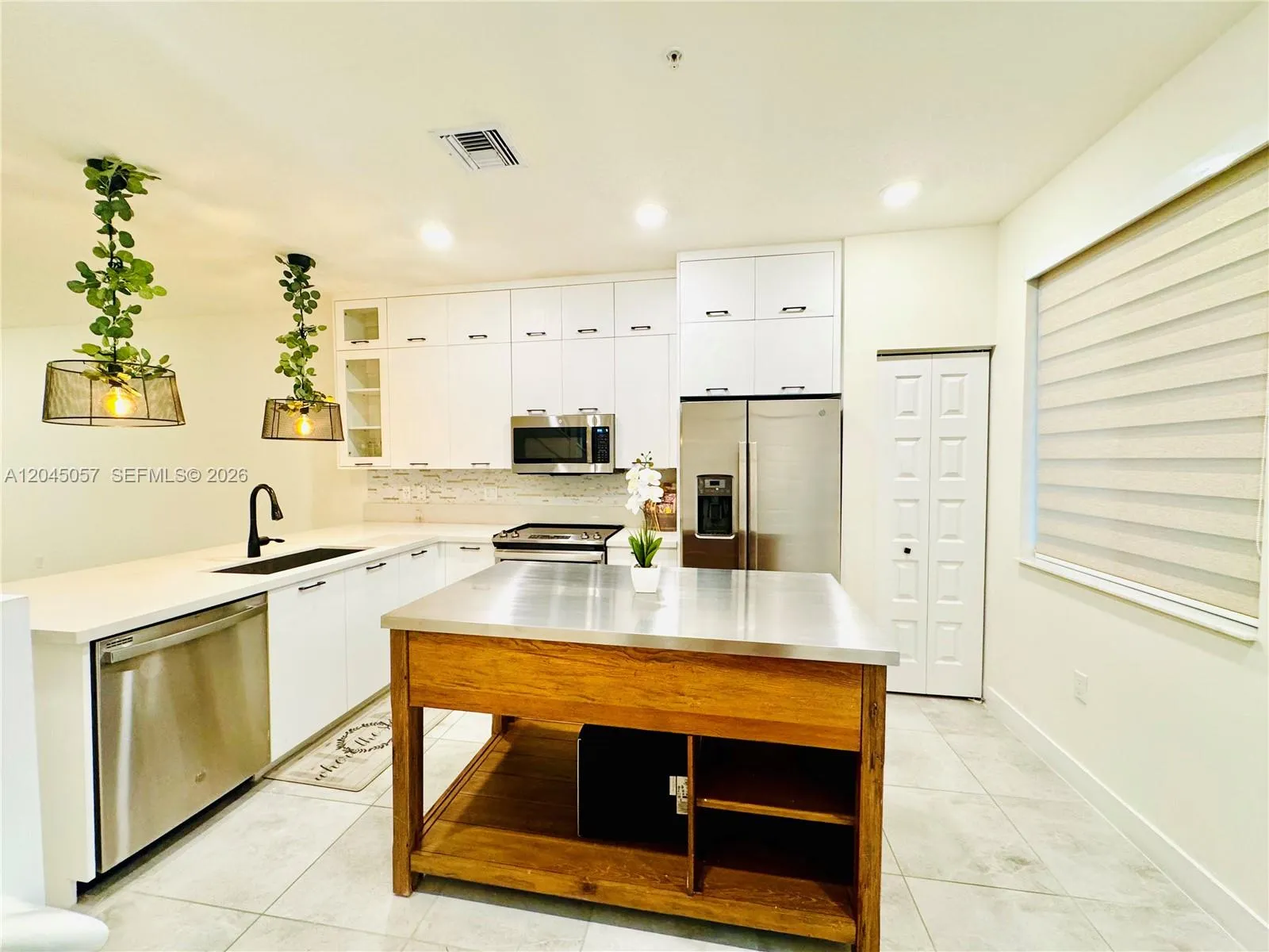 Foto de propiedad en 10295 NW 64th Terrace 104, Doral, FL 33178 Doral con MLS# 