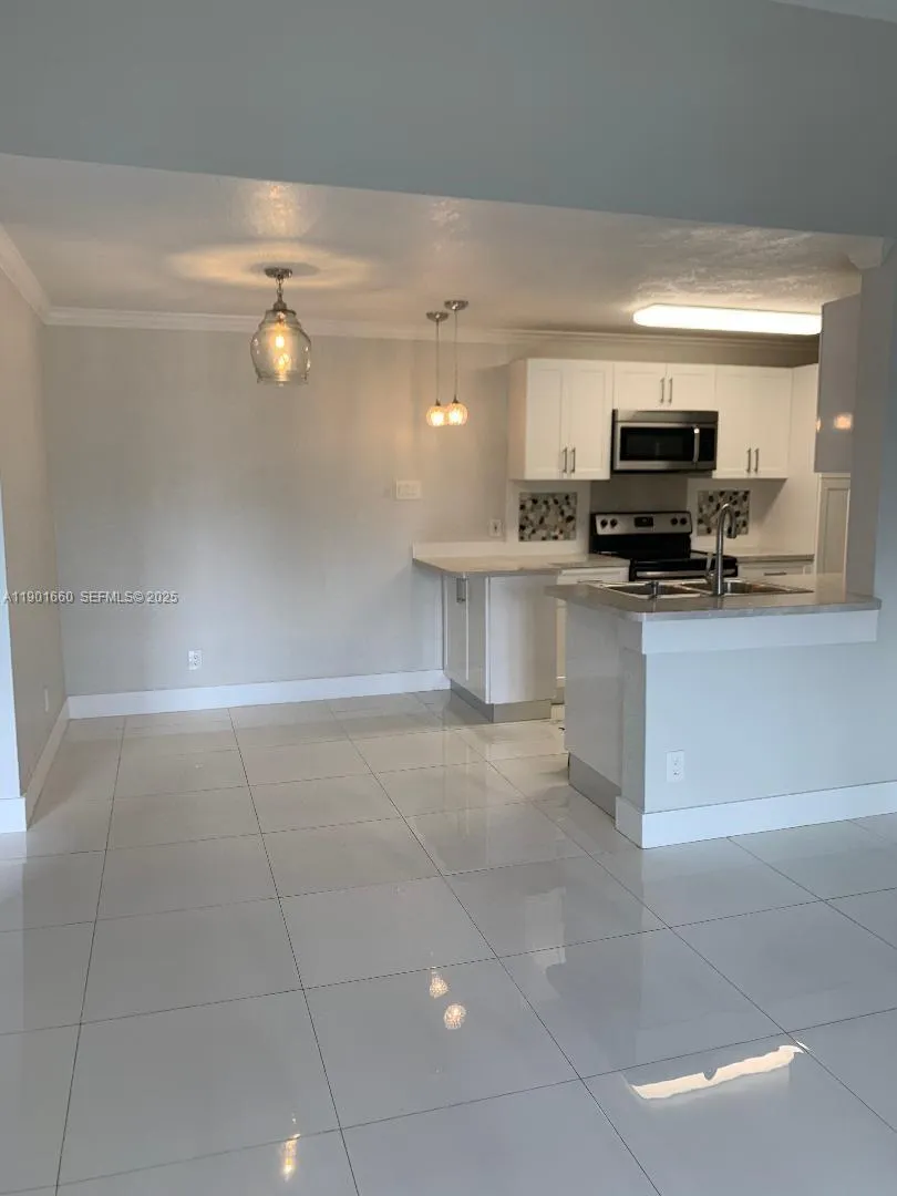 Foto de propiedad en 10370 SW 150th Court 9202, Miami, FL 33196 Miami con MLS# 