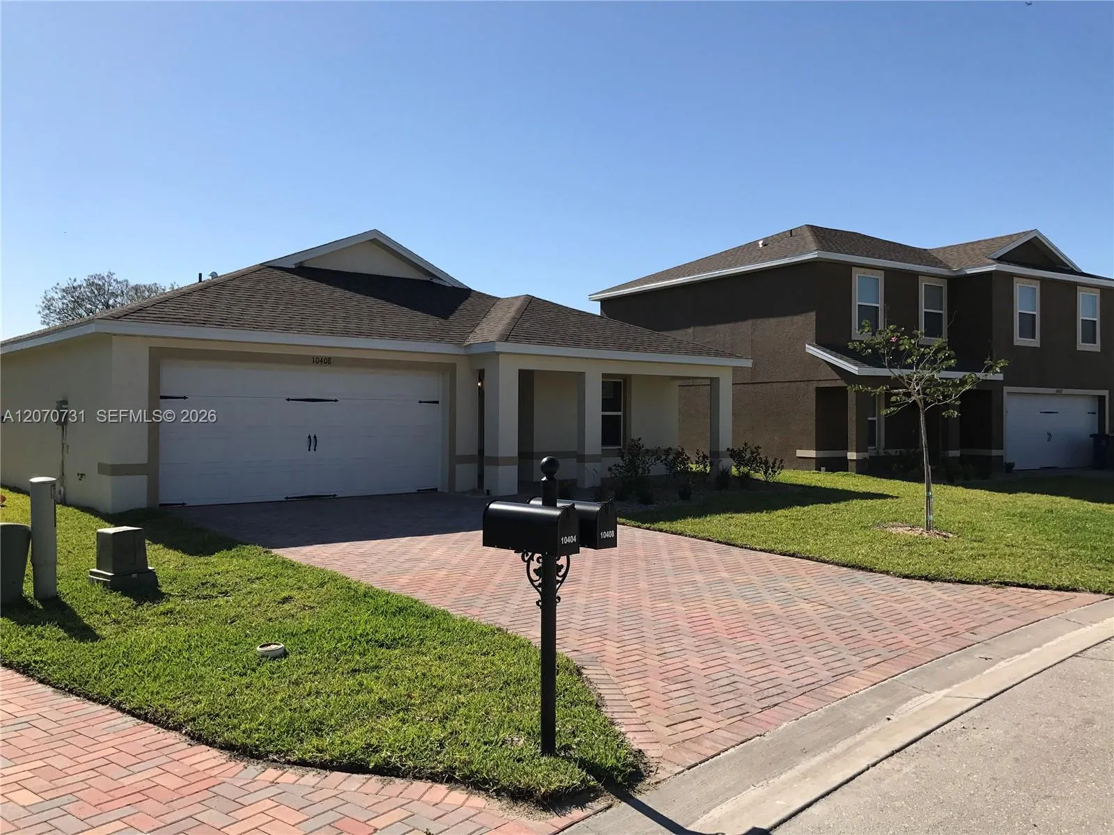 Foto de propiedad en 10408 Canal Brook Lane 10408, FL 33936  con MLS# 