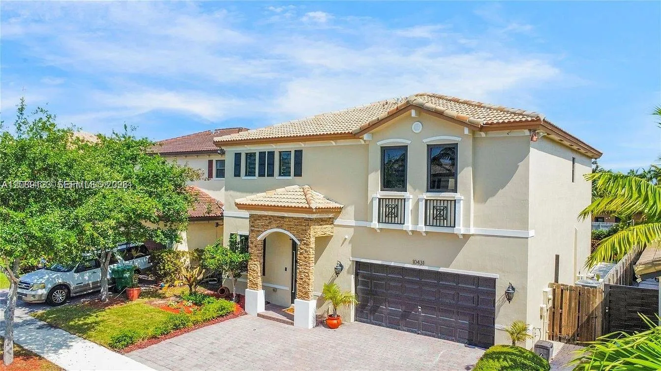 Foto de propiedad en 10431 SW 228th Terrace, Miami, FL 33190 Miami con MLS# 