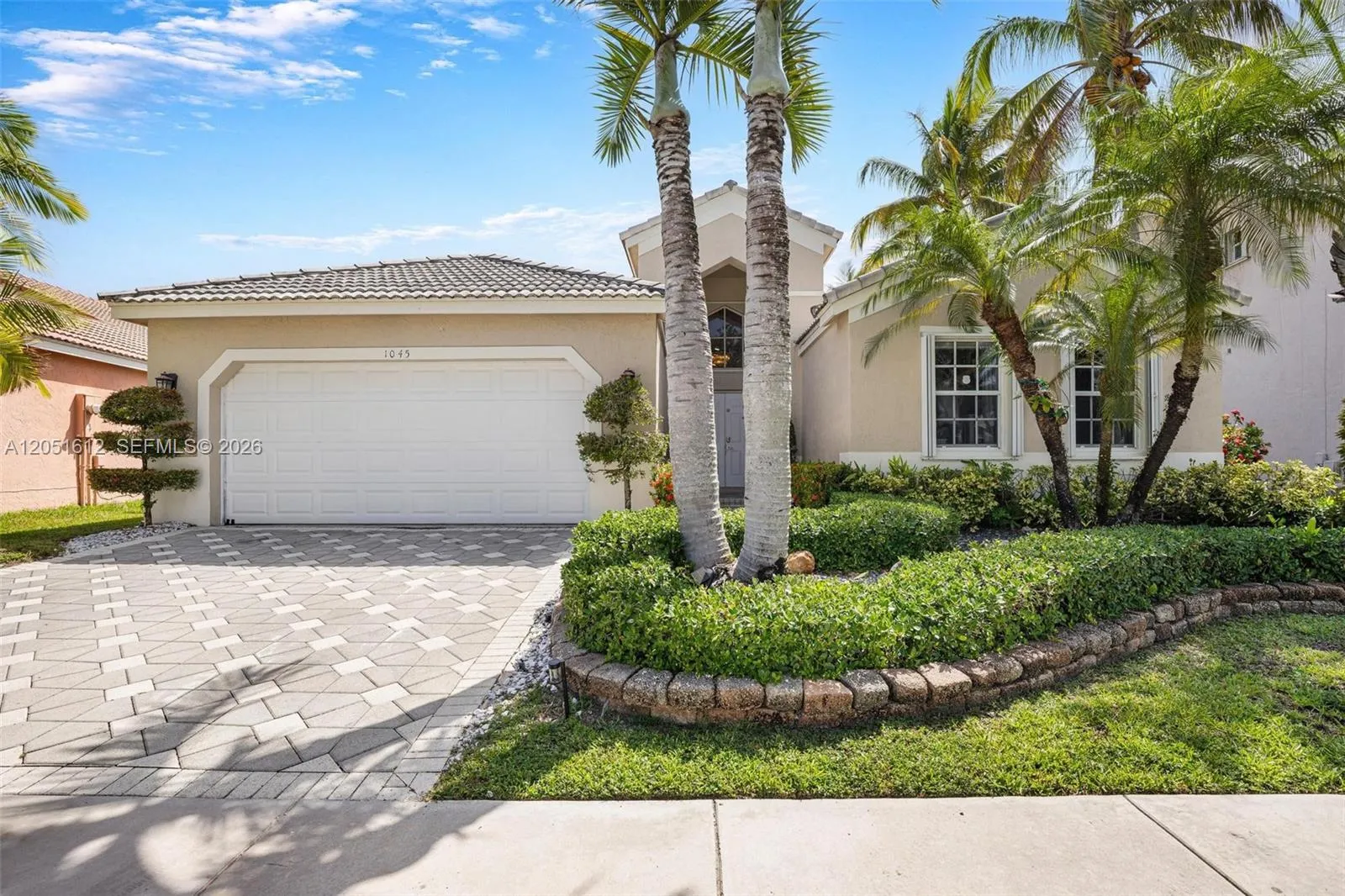 Foto de propiedad en 1045 Cedar Falls Drive 0, Weston, FL 33327 Weston con MLS# 