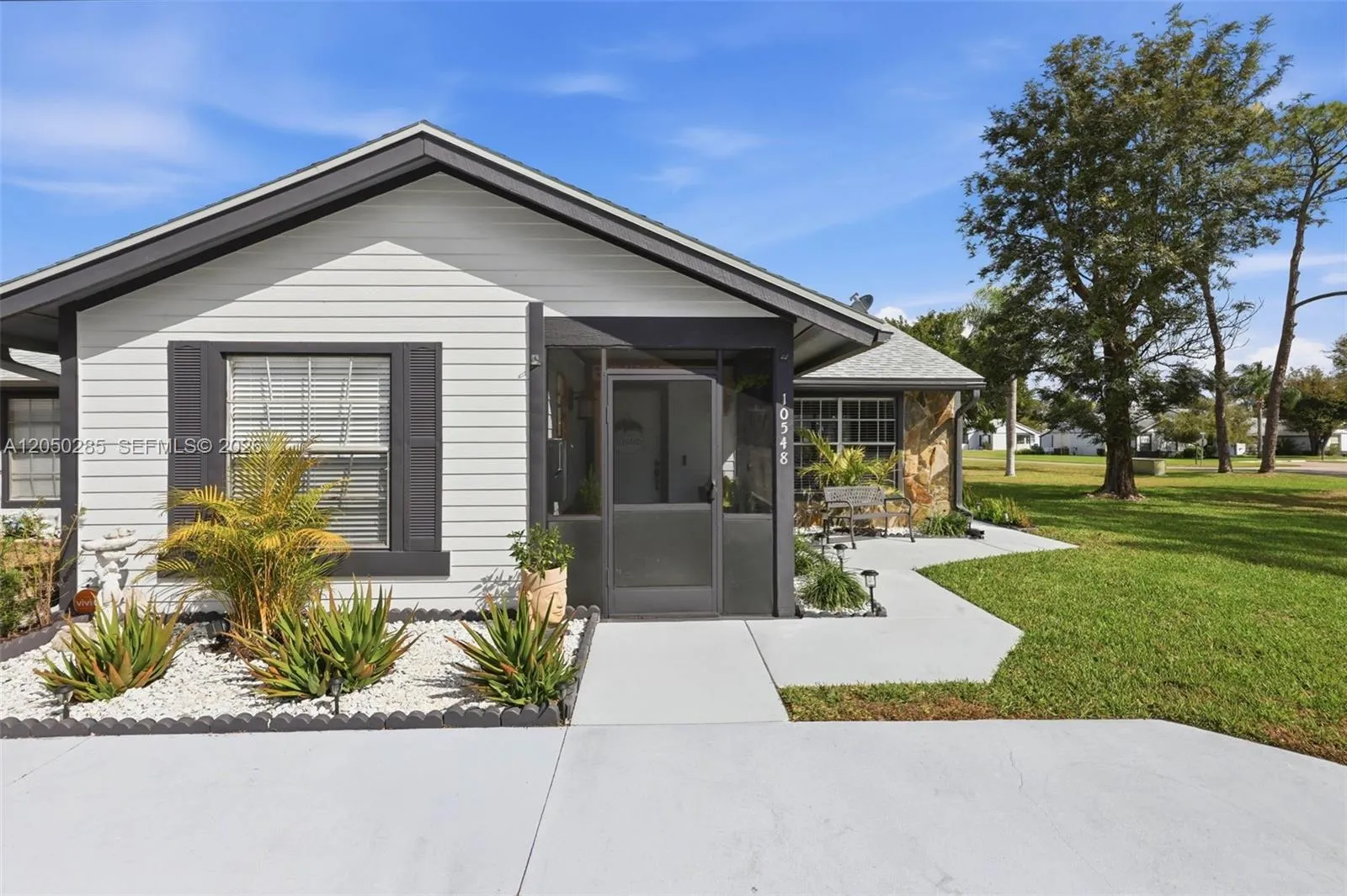 Foto de propiedad en 10548 Quincy Court, Lehigh Acres, FL 33936 Lehigh Acres con MLS# 