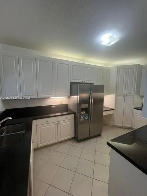 Foto de propiedad en 10720 NW 66th Street 305, Doral, FL 33178 Doral con MLS# 