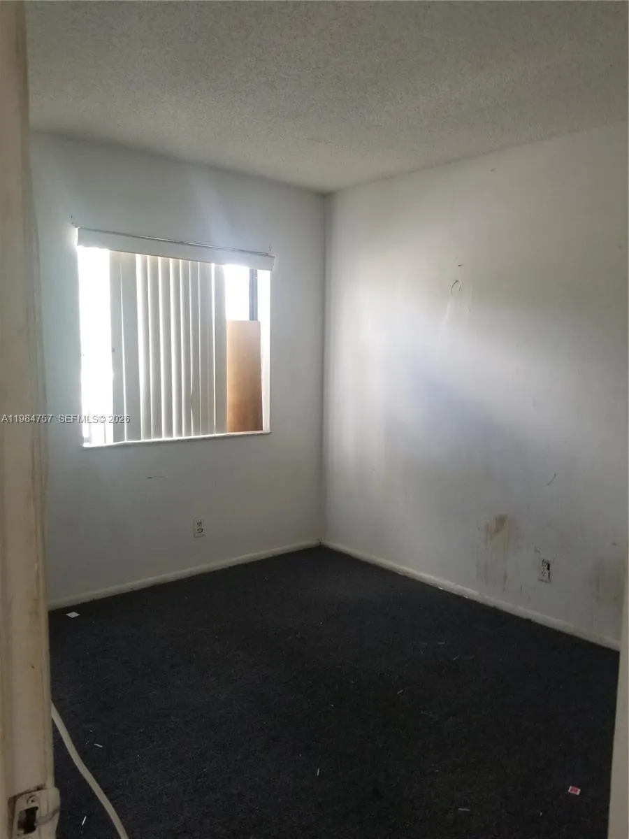 Foto de propiedad en 10886 Royal Palm Boulevard 10886, Coral Springs, FL 33065 Coral Springs con MLS# 