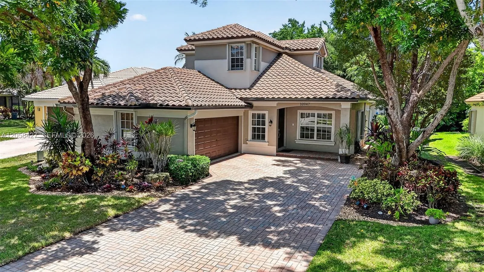 Foto de propiedad en 10947 NW 61st Court, Parkland, FL 33076 Parkland con MLS# 