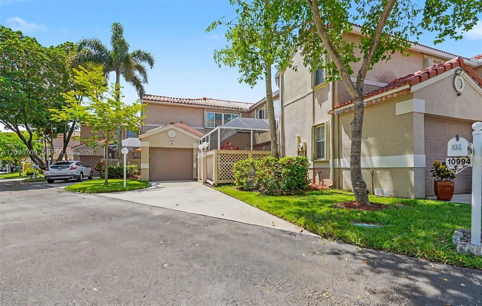 Foto de propiedad en 10994 Neptune Drive 10994, Cooper City, FL 33026 Cooper City con MLS# 