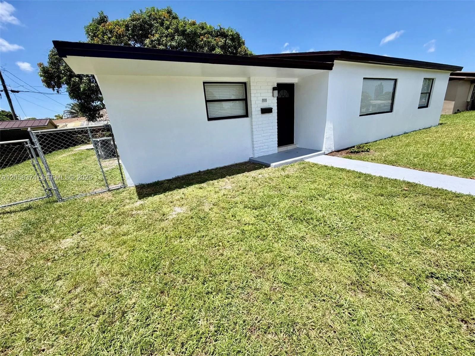 Foto de propiedad en 1101 NW 201st Street, Miami Gardens, FL 33169 Miami Gardens con MLS# 