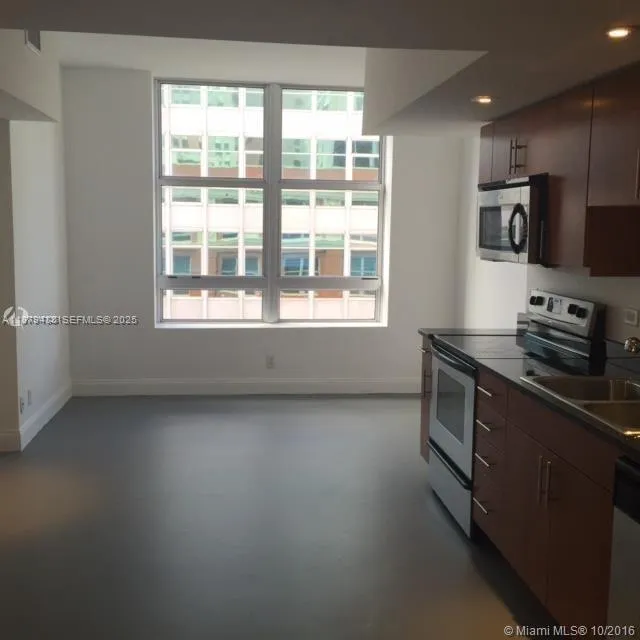 Foto de propiedad en 111 E Flagler Street 1003, Miami, FL 33131 Miami con MLS# 