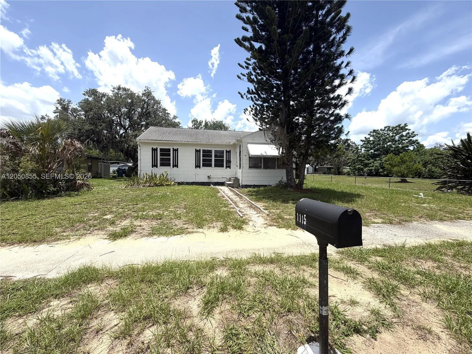 Foto de propiedad en 1115 Edgemoor Avenue, FL 33870  con MLS# 