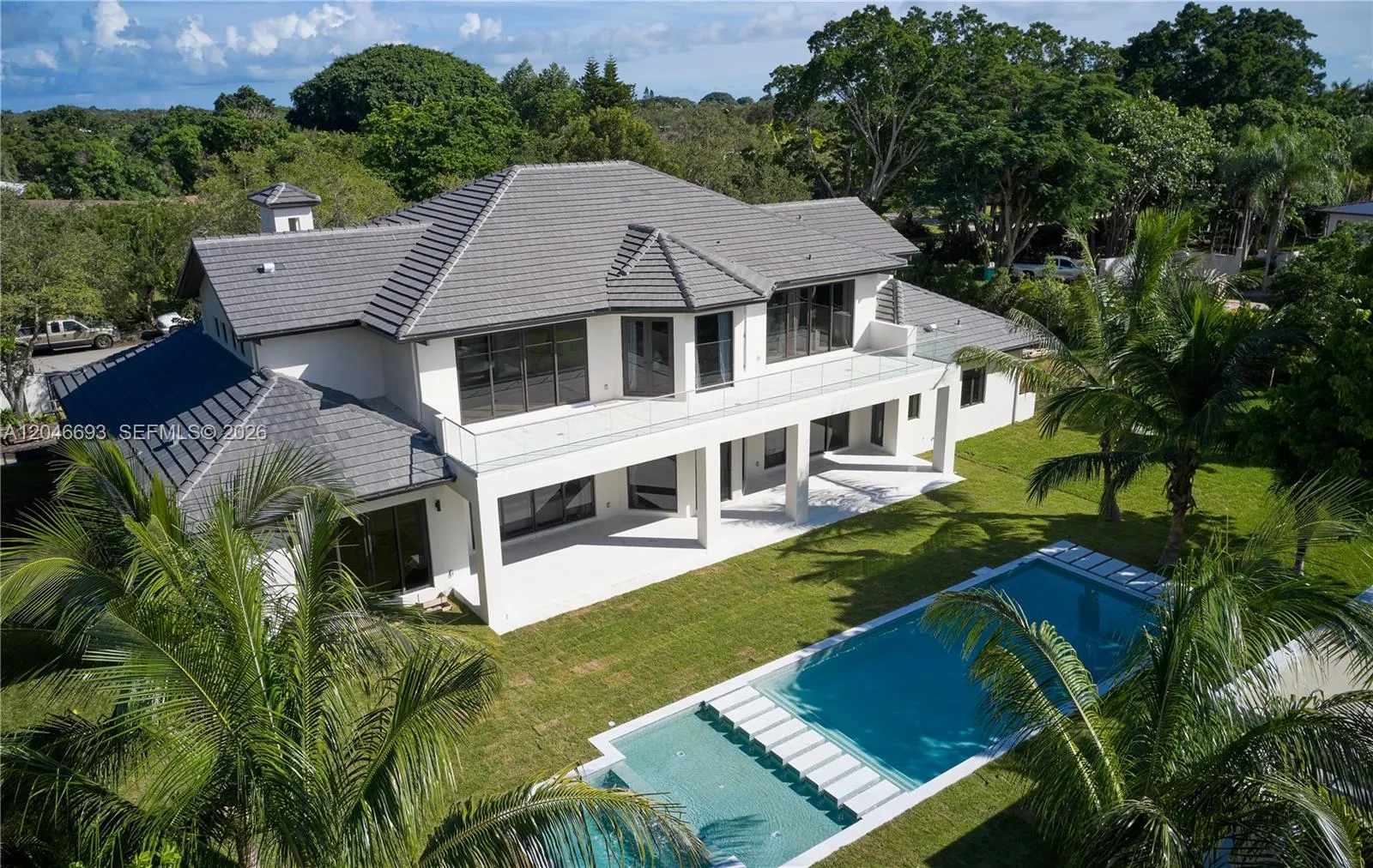 Foto de propiedad en 11200 SW 60th Avenue, Pinecrest, FL 33156 Pinecrest con MLS# 
