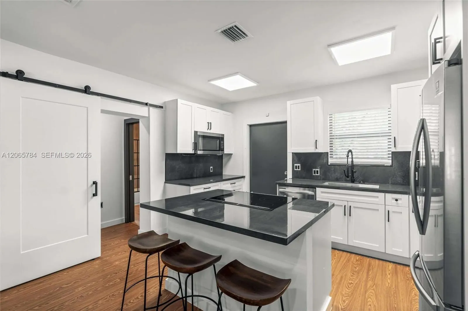 Foto de propiedad en 1121 NW 57th Street, Miami, FL 33127 Miami con MLS# 