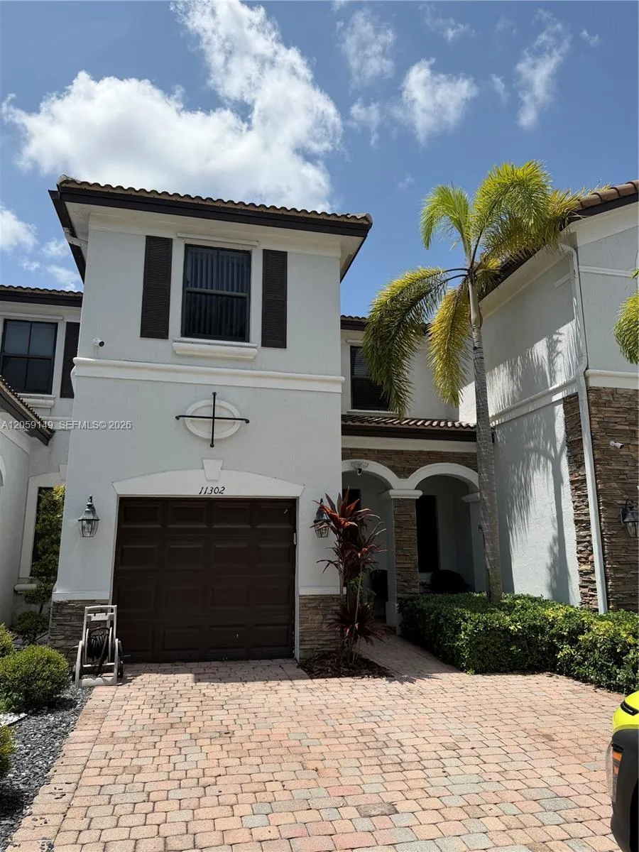 Foto de propiedad en 11302 NW 88th Terrace 11302, Doral, FL 33178 Doral con MLS# 