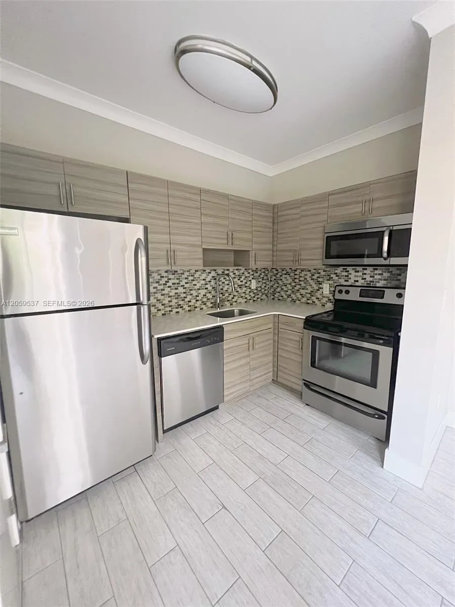 Foto de propiedad en 115 Menores Avenue 12, Coral Gables, FL 33134 Coral Gables con MLS# 