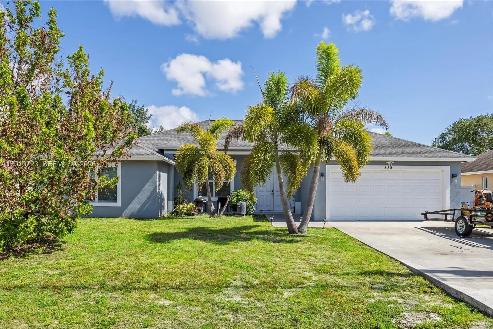 Foto de propiedad en 115 SW Glenwood Drive, Port St. Lucie, FL 34984 Port St. Lucie con MLS# 