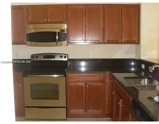 Foto de propiedad en 11501 NW 89th Street 105, Doral, FL 33178 Doral con MLS# 