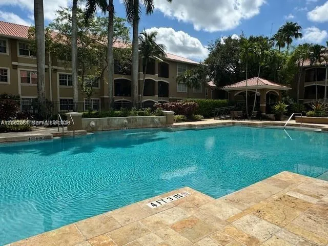 Foto de propiedad en 11601 SW 2nd Street 21202, Pembroke Pines, FL 33025 Pembroke Pines con MLS# 