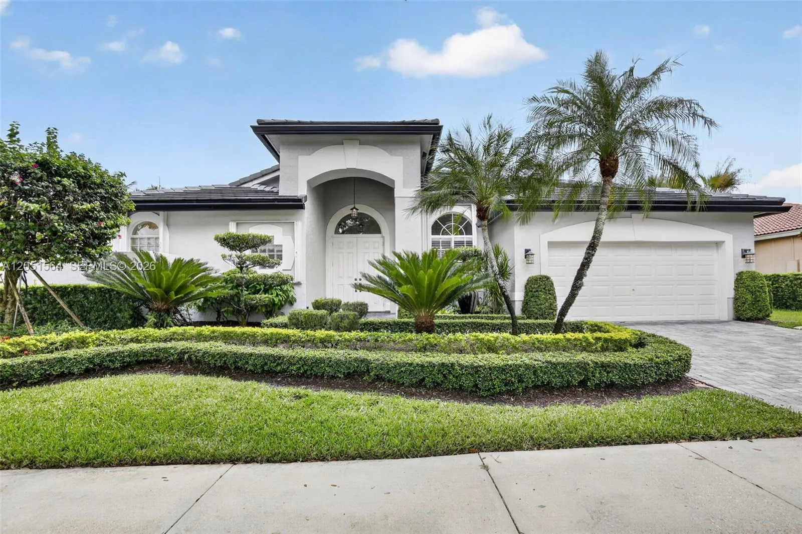 Foto de propiedad en 1164 Ginger Circle, Weston, FL 33326 Weston con MLS# 