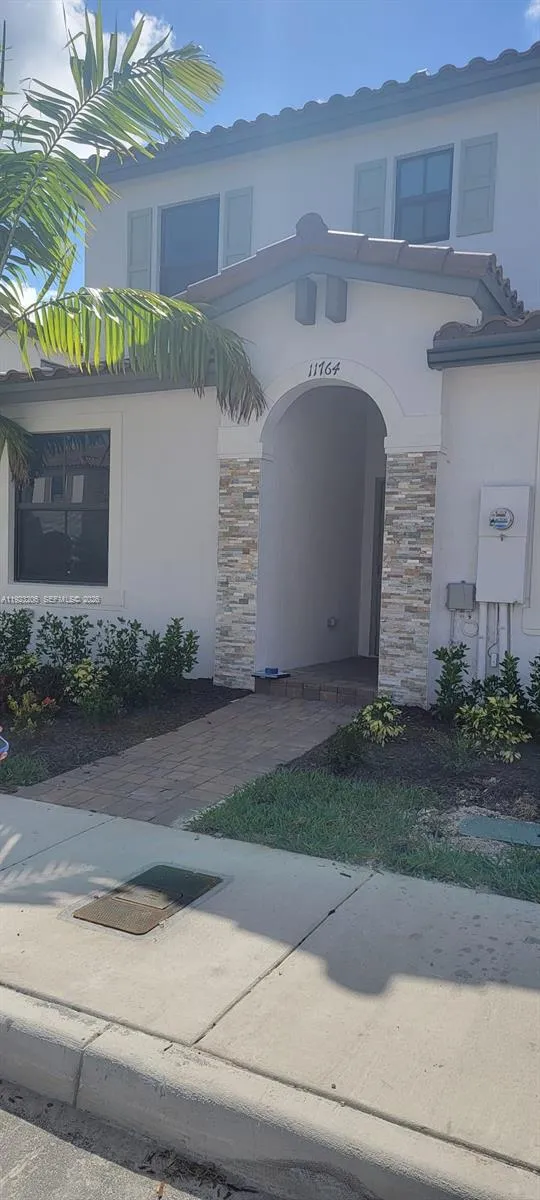 Foto de propiedad en 11764 SW 245th Terrace, Homestead, FL 33032 Homestead con MLS# 