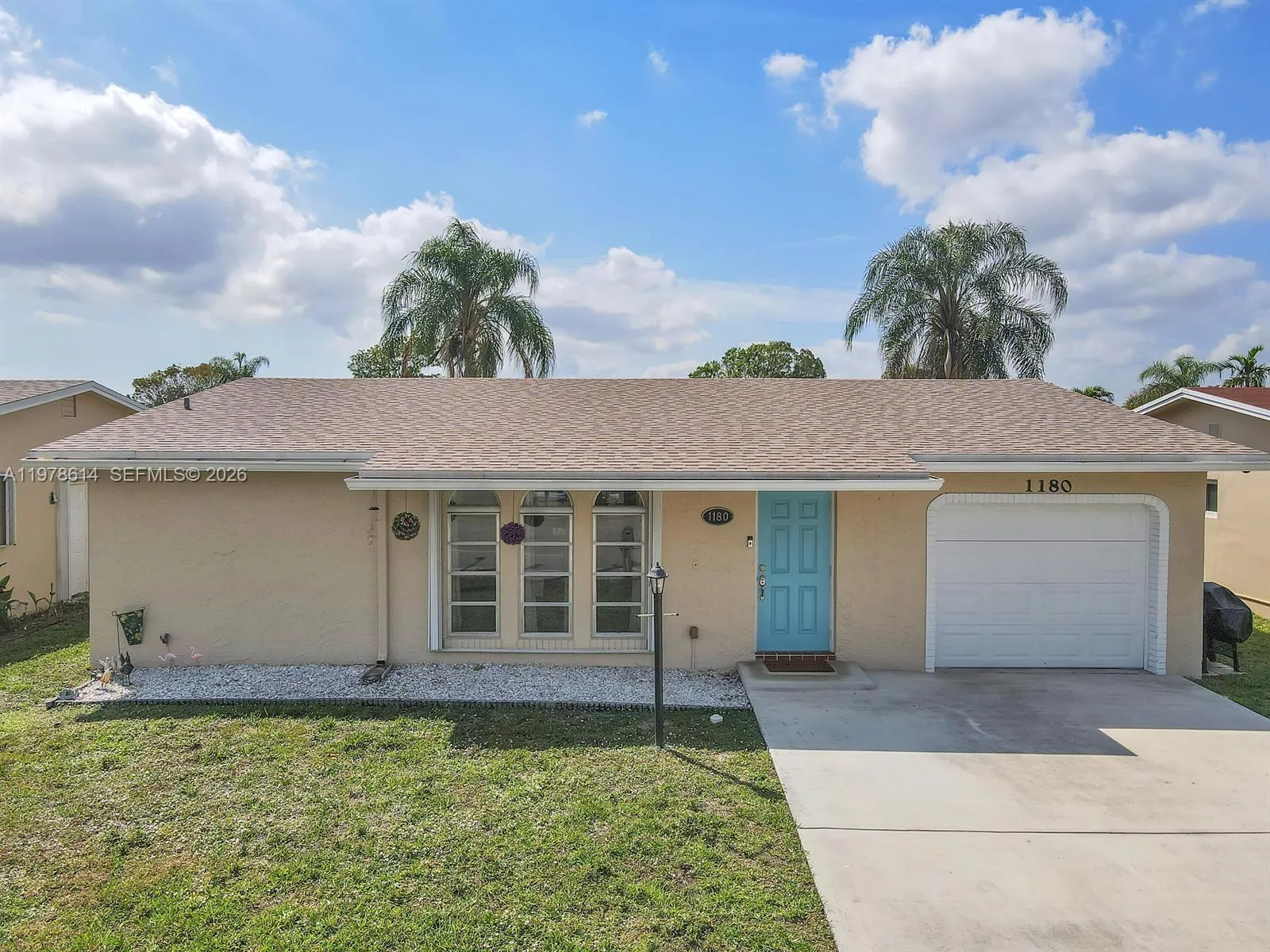 Foto de propiedad en 1180 NW 49th Court, Deerfield Beach, FL 33064 Deerfield Beach con MLS# 