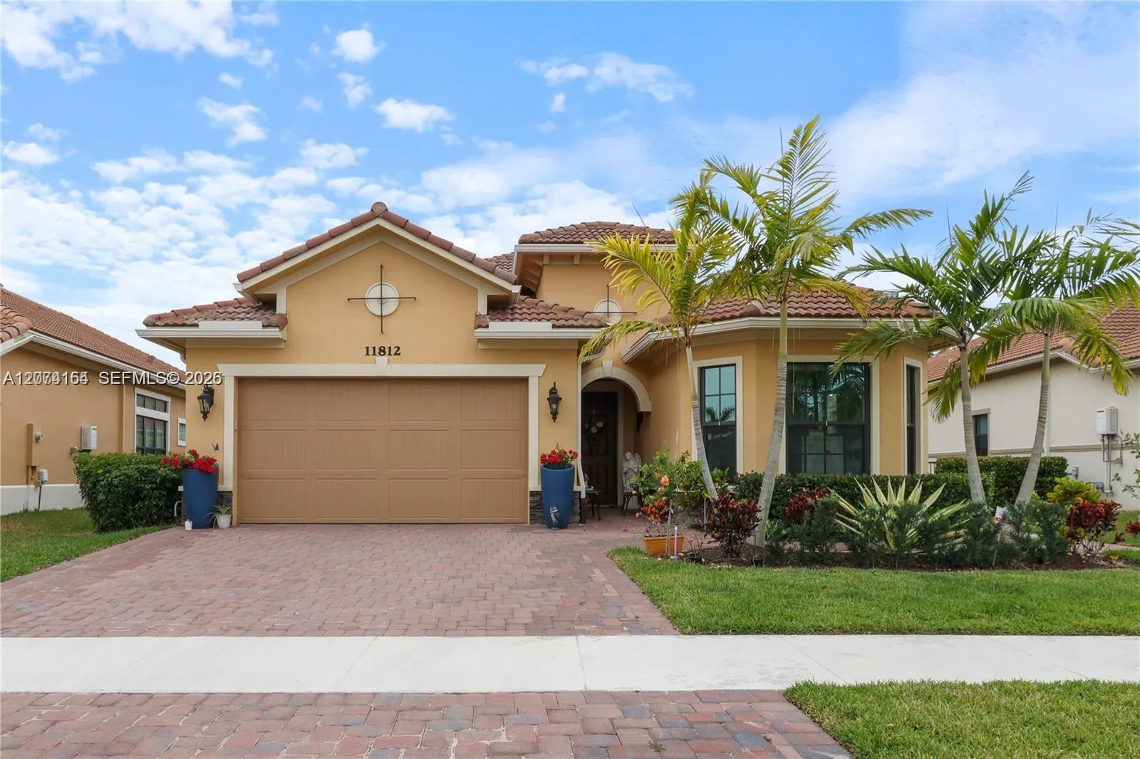 Foto de propiedad en 11812 S Cantal Circle S, Parkland, FL 33076 Parkland con MLS# 