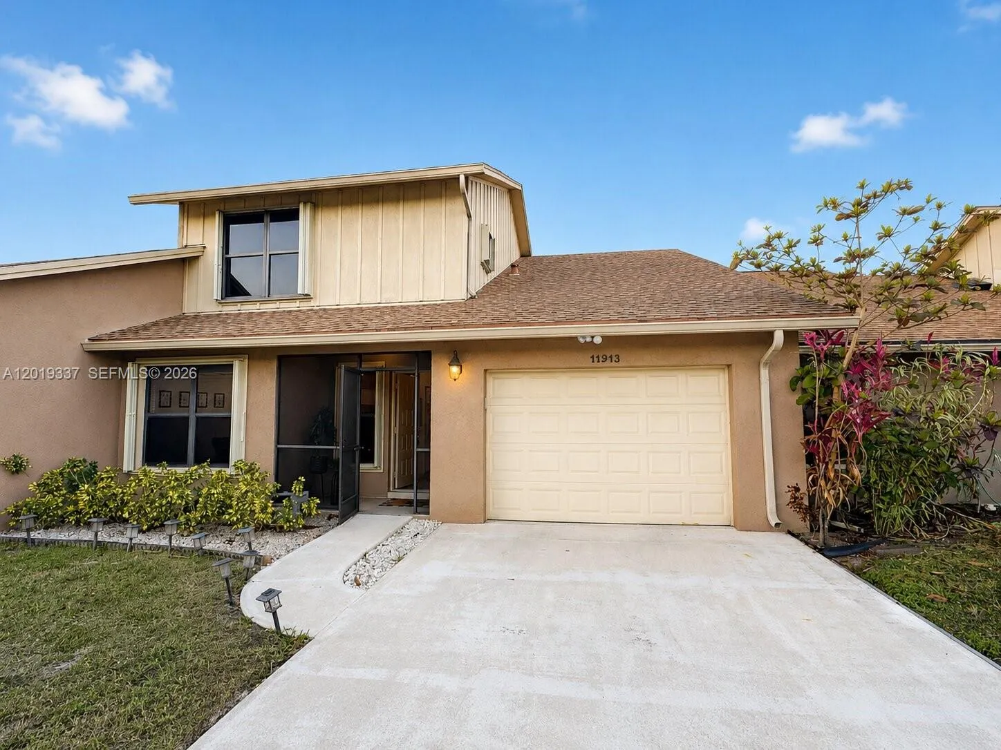 Foto de propiedad en 11913 Donlin Drive, Wellington, FL 33414 Wellington con MLS# 