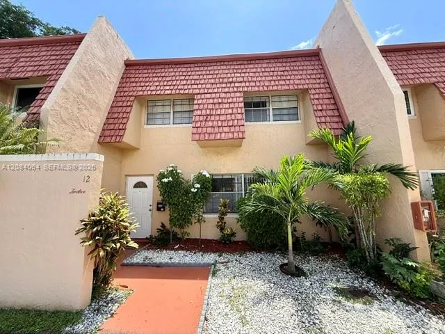 Foto de propiedad en 12 Meacham Lane 12, Tamarac, FL 33319 Tamarac con MLS# 