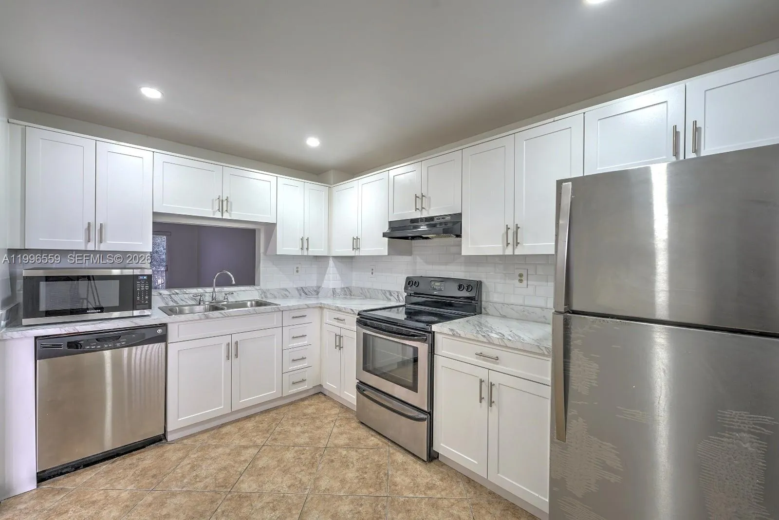 Foto de propiedad en 1200 NW 87th Avenue 410, Coral Springs, FL 33071 Coral Springs con MLS# 
