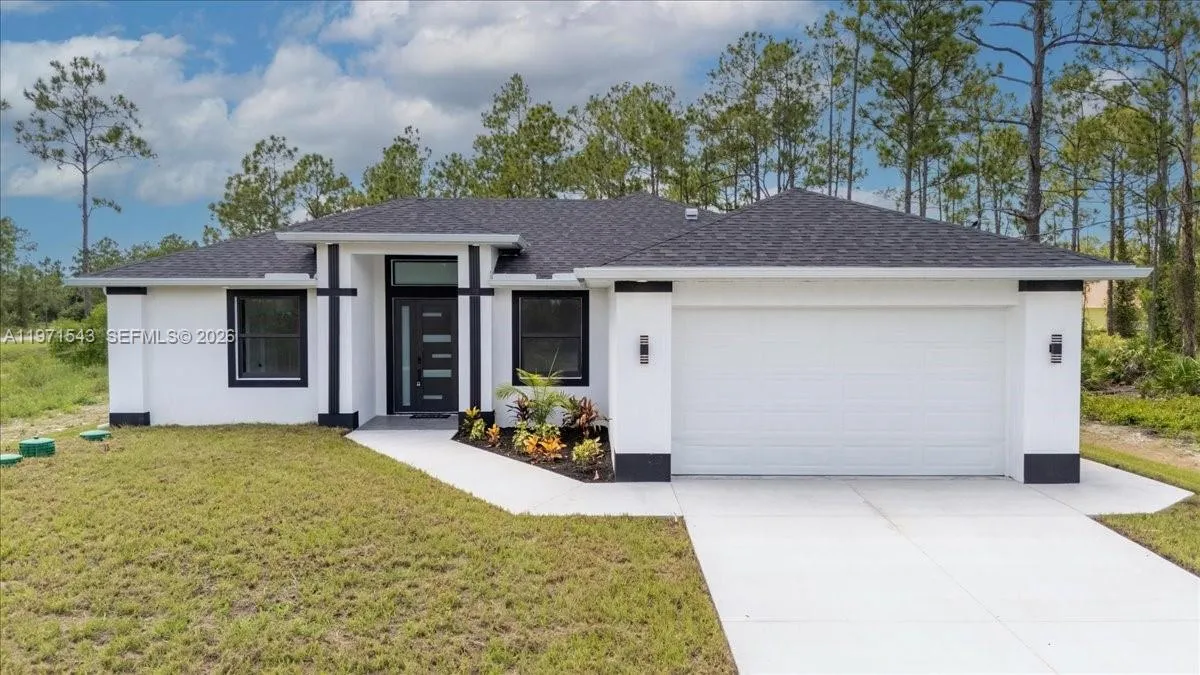 Foto de propiedad en 1201 Johns Avenue, Lehigh Acres, FL 33909 Lehigh Acres con MLS# 