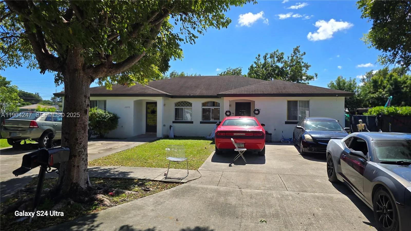 Foto de propiedad en 12040 SW 215th Street, Miami, FL 33177 Miami con MLS# 
