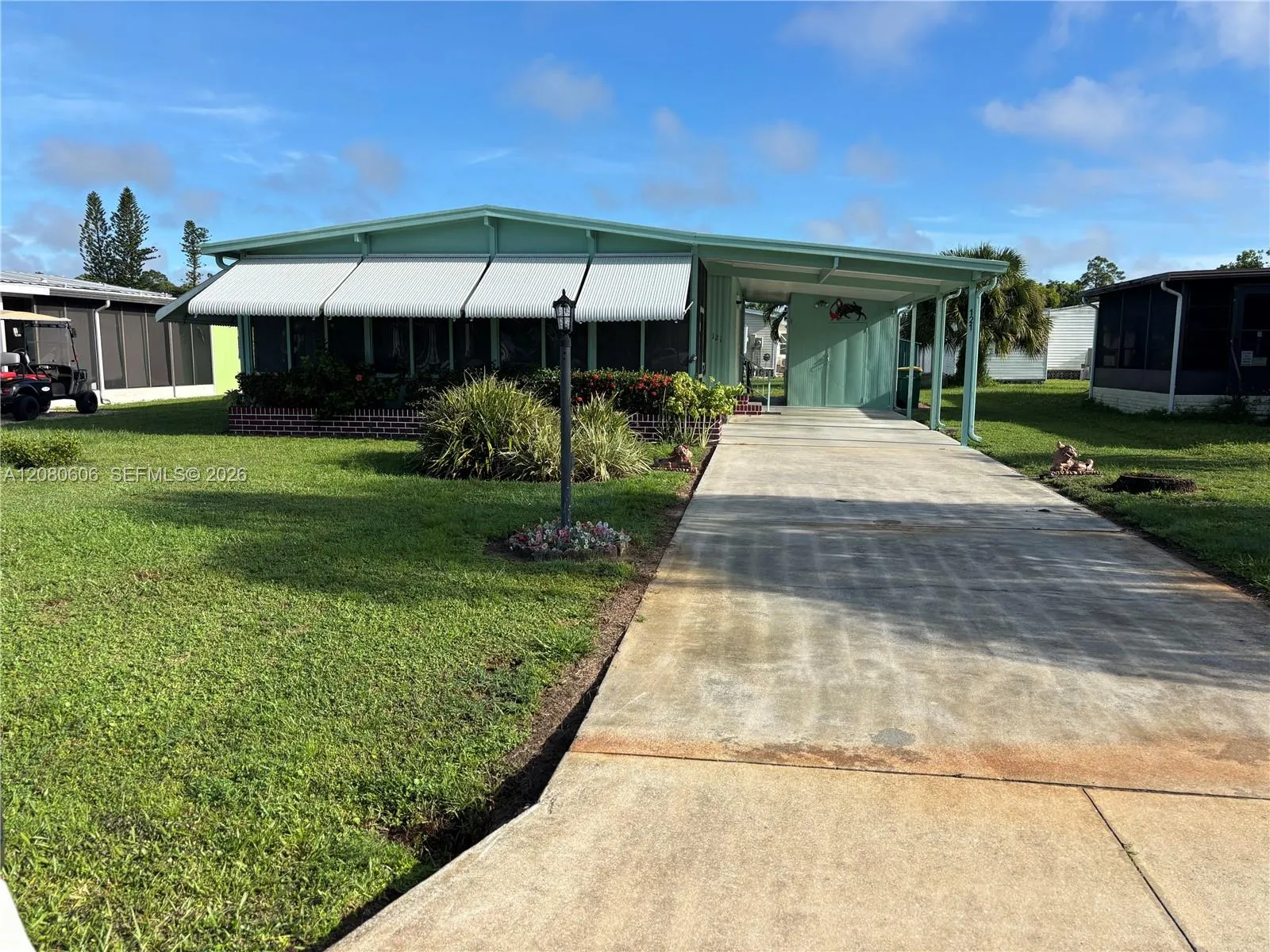 Foto de propiedad en 121 Sugar Loaf 63, Naples, FL 34114 Naples con MLS# 