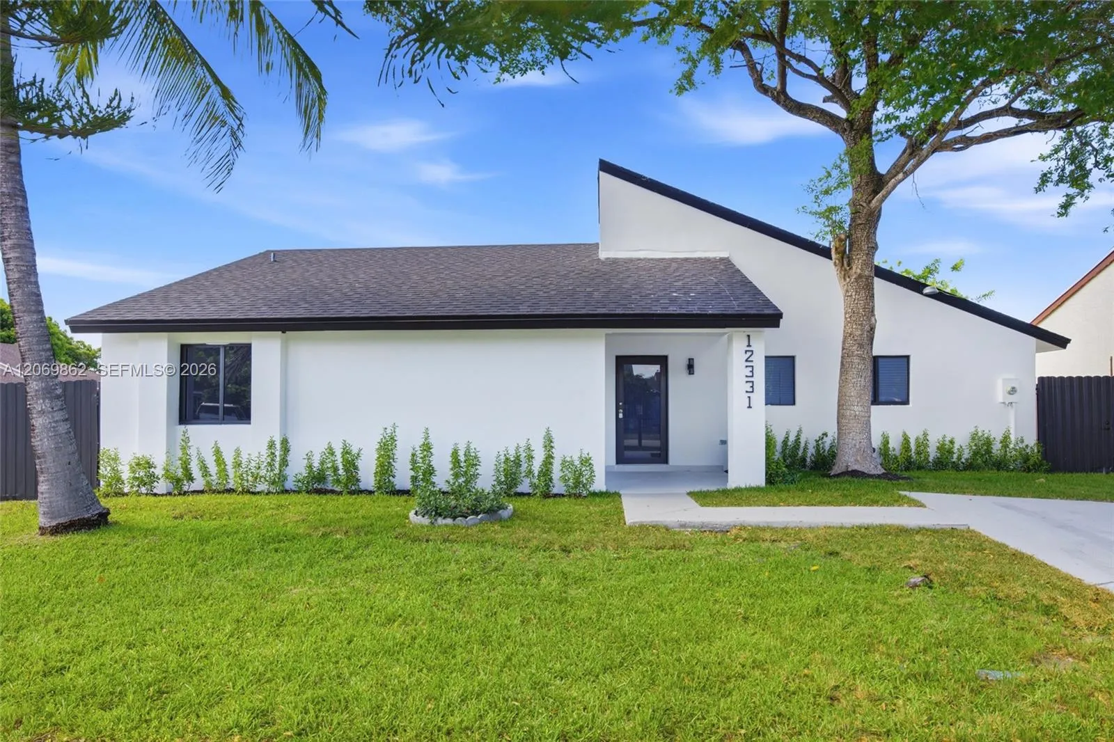 Foto de propiedad en 12331 SW 203rd Terrace, Miami, FL 33177 Miami con MLS# 