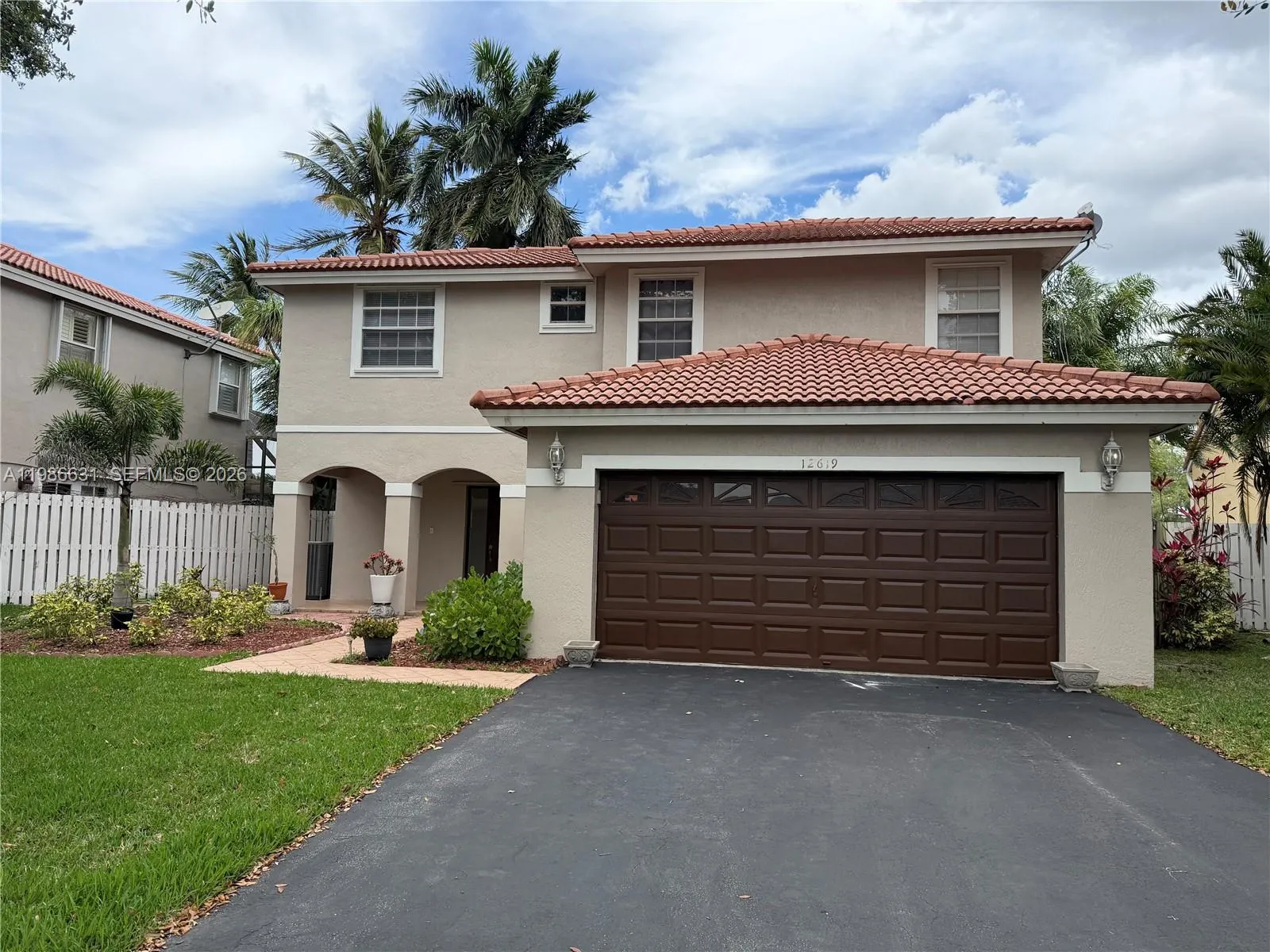 Foto de propiedad en 12619 NW 11th Place, Sunrise, FL 33323 Sunrise con MLS# 