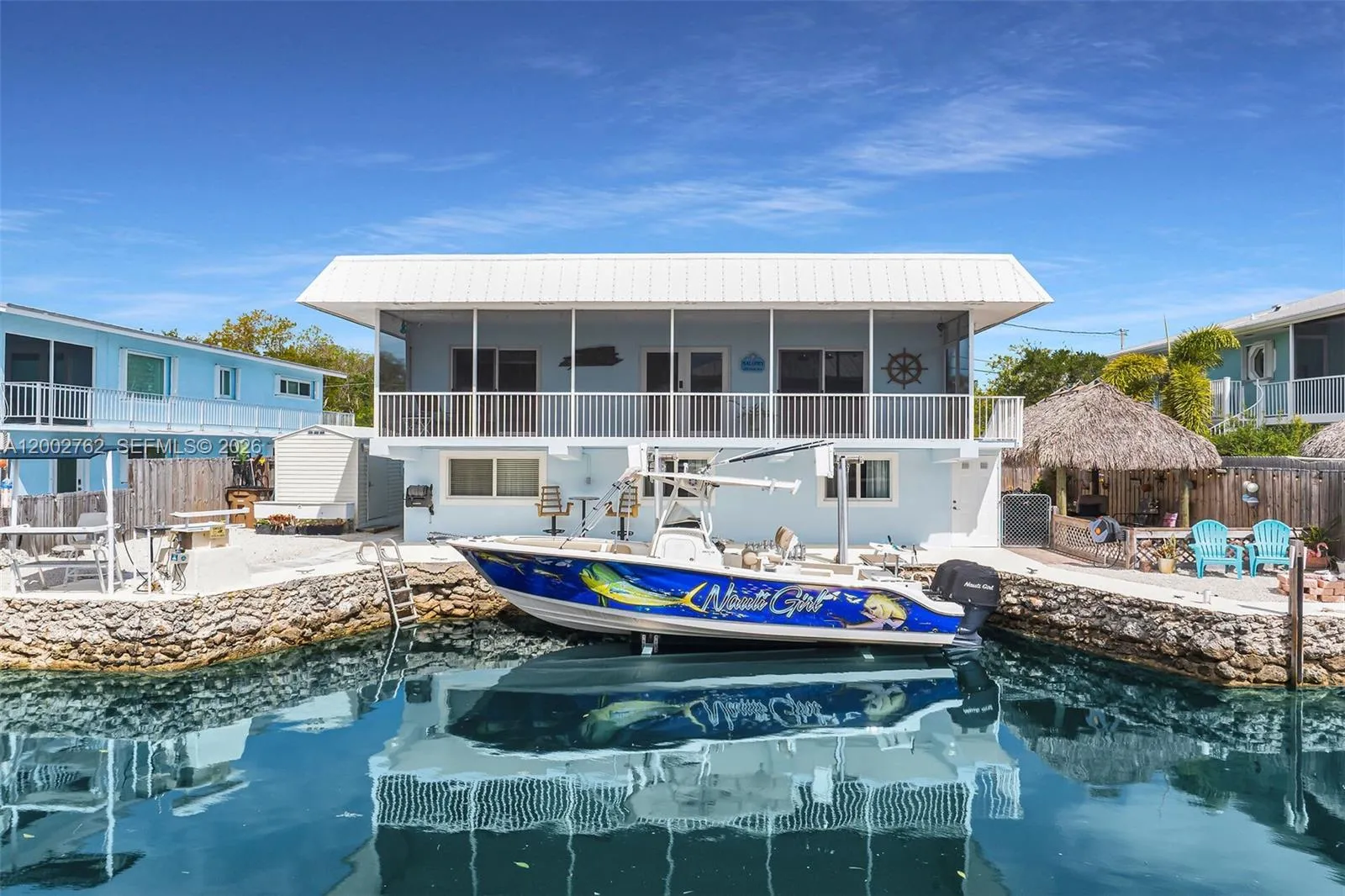 Foto de propiedad en 128 Dove Avenue, Tavernier, FL 33070 Tavernier con MLS# 