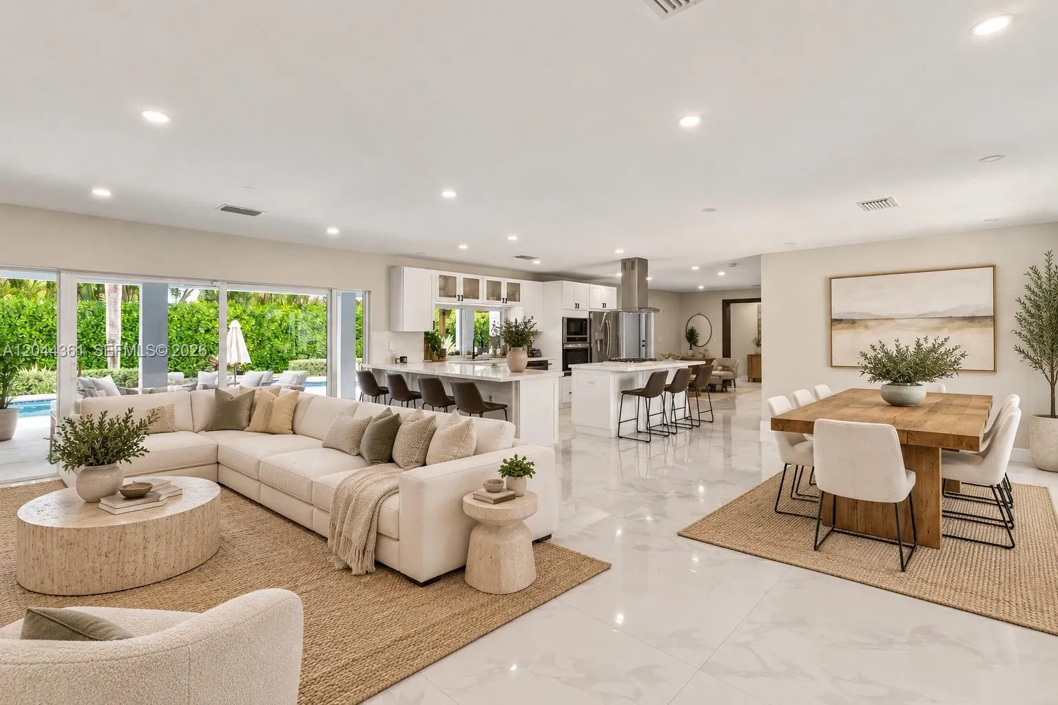Virtually staged - Open layout living, kitchen, and dining