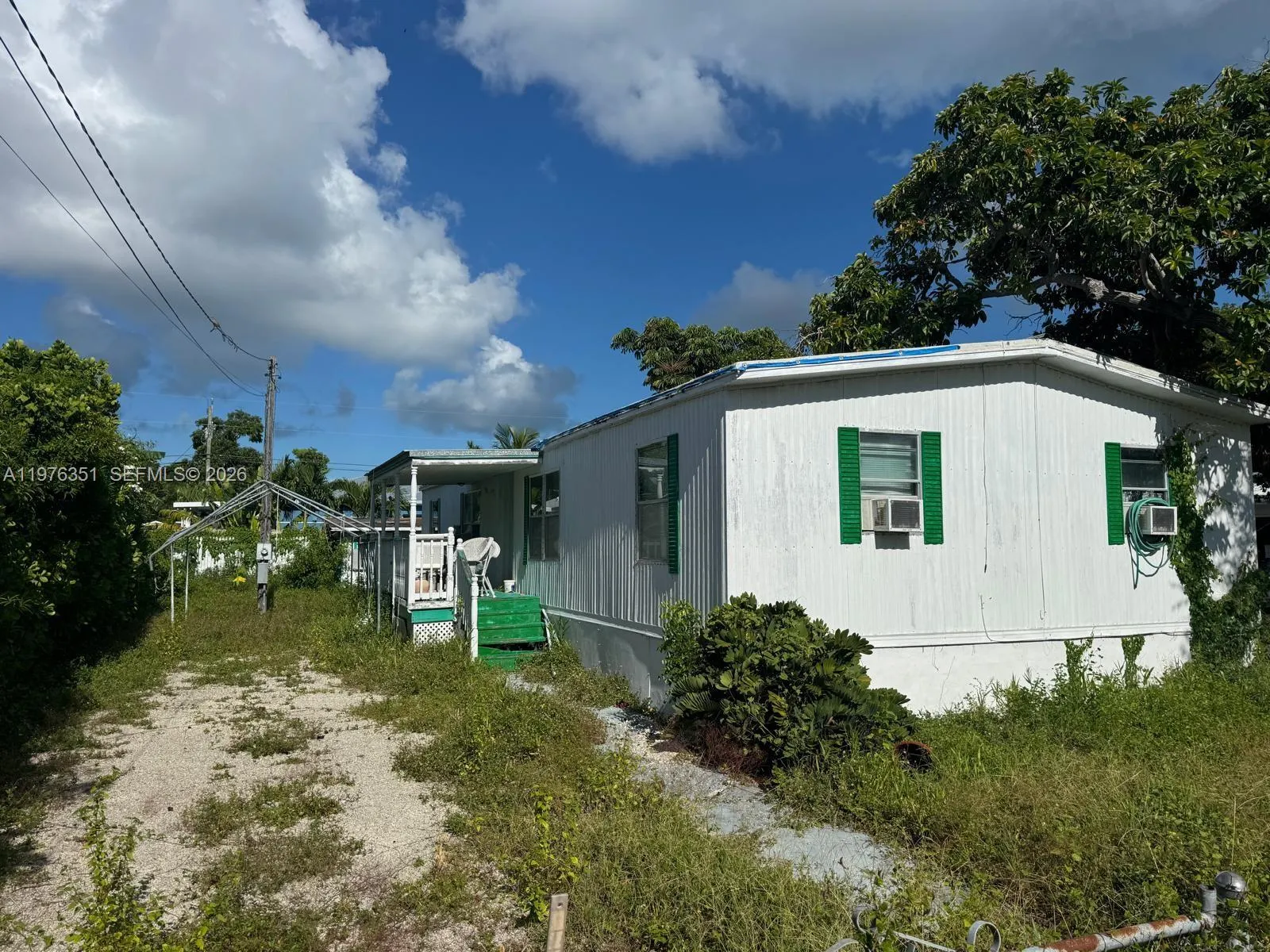 Foto de propiedad en 13 Judy Place, Key Largo, FL 33037 Key Largo con MLS# 