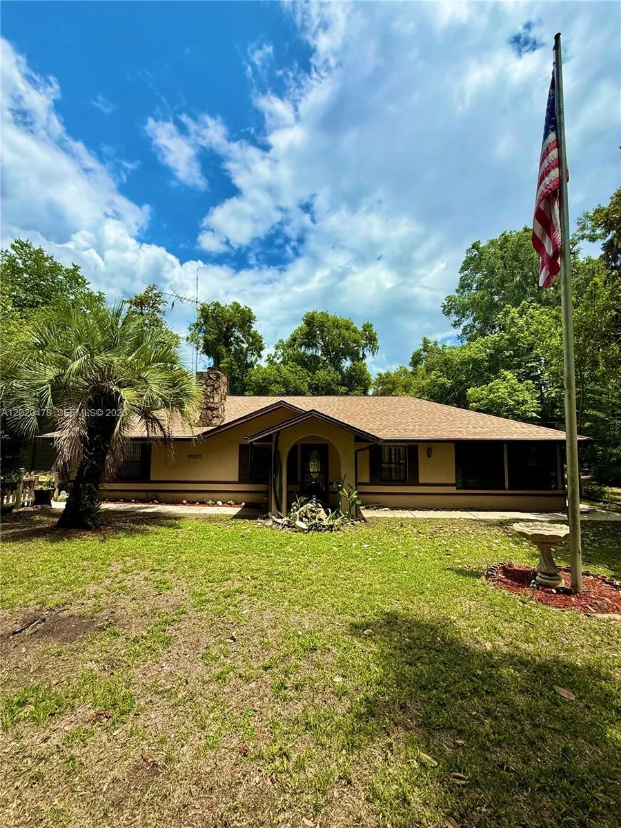 Foto de propiedad en 13167 SE 39th Court, FL 34420  con MLS# 