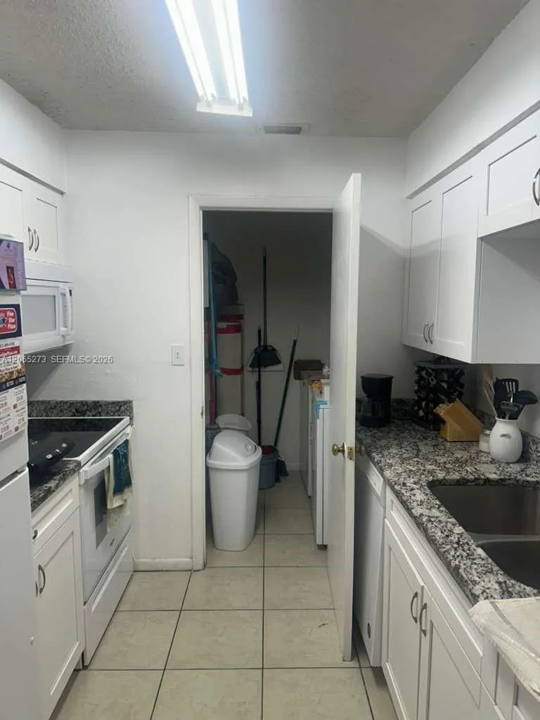Foto de propiedad en 13287 Arbor Pointe Circle 304, Tampa, FL 33617 Tampa con MLS# 