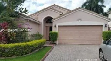 Foto de propiedad en 1331 NW 144 Avenue, Pembroke Pines, FL 33028 Pembroke Pines con MLS# 