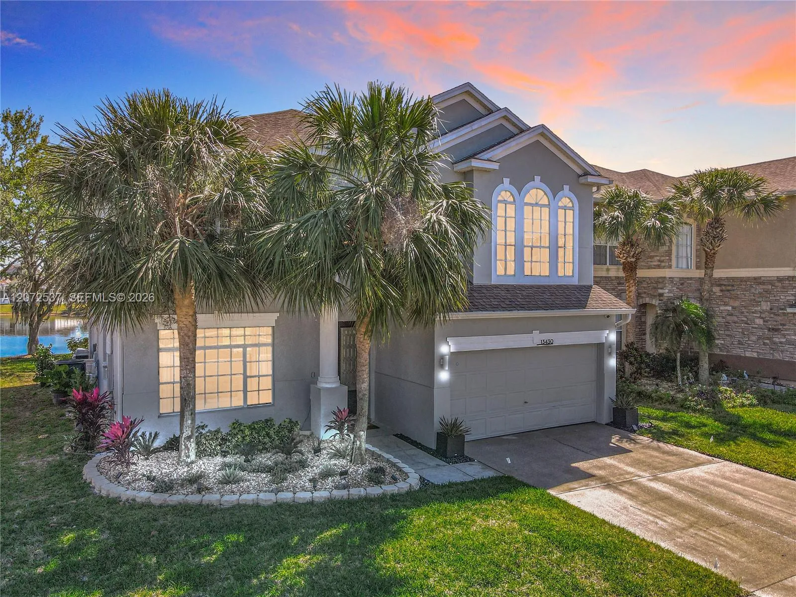 Foto de propiedad en 13430 Meadow Bay Loop, Orlando, FL 32824 Orlando con MLS# 