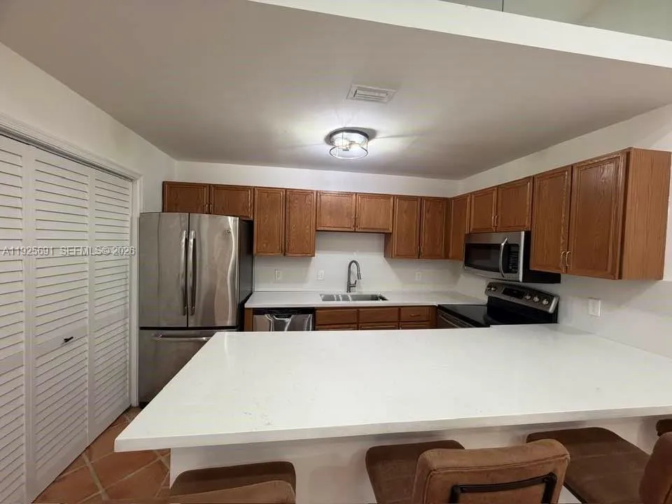 Foto de propiedad en 13680 Yarmouth Court C, Wellington, FL 33414 Wellington con MLS# 