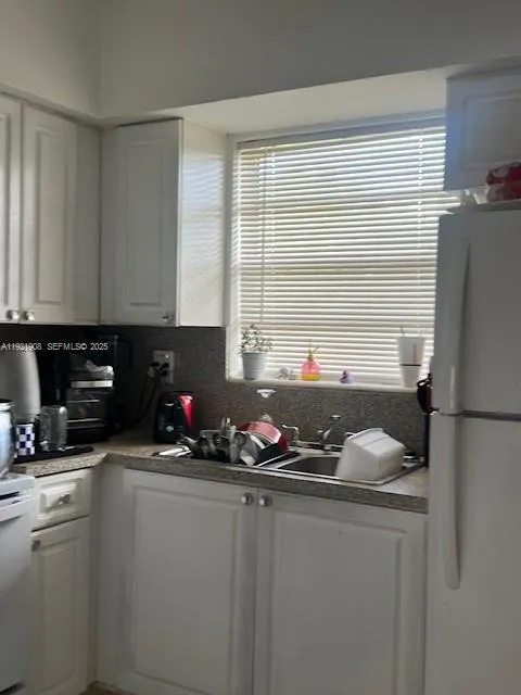Foto de propiedad en 1370 NE 119th Street 137014, Miami, FL 33161 Miami con MLS# 