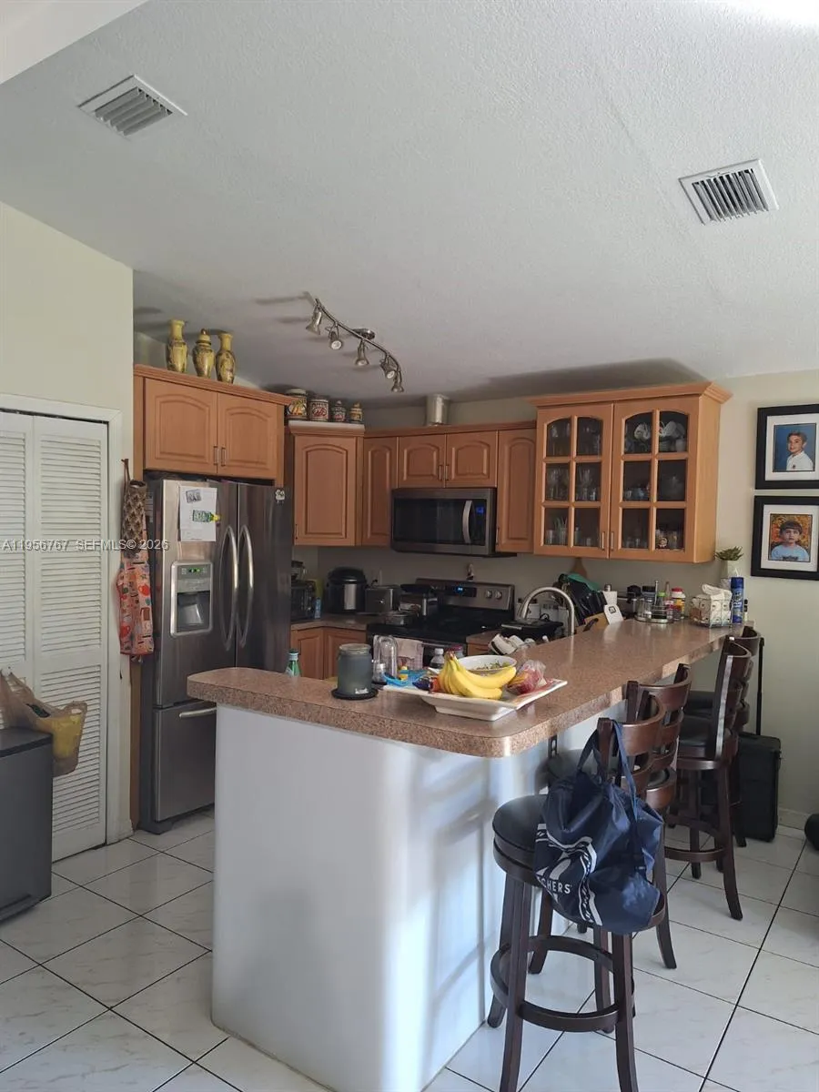Foto de propiedad en 13822 SW 156th Street, Miami, FL 33177 Miami con MLS# 