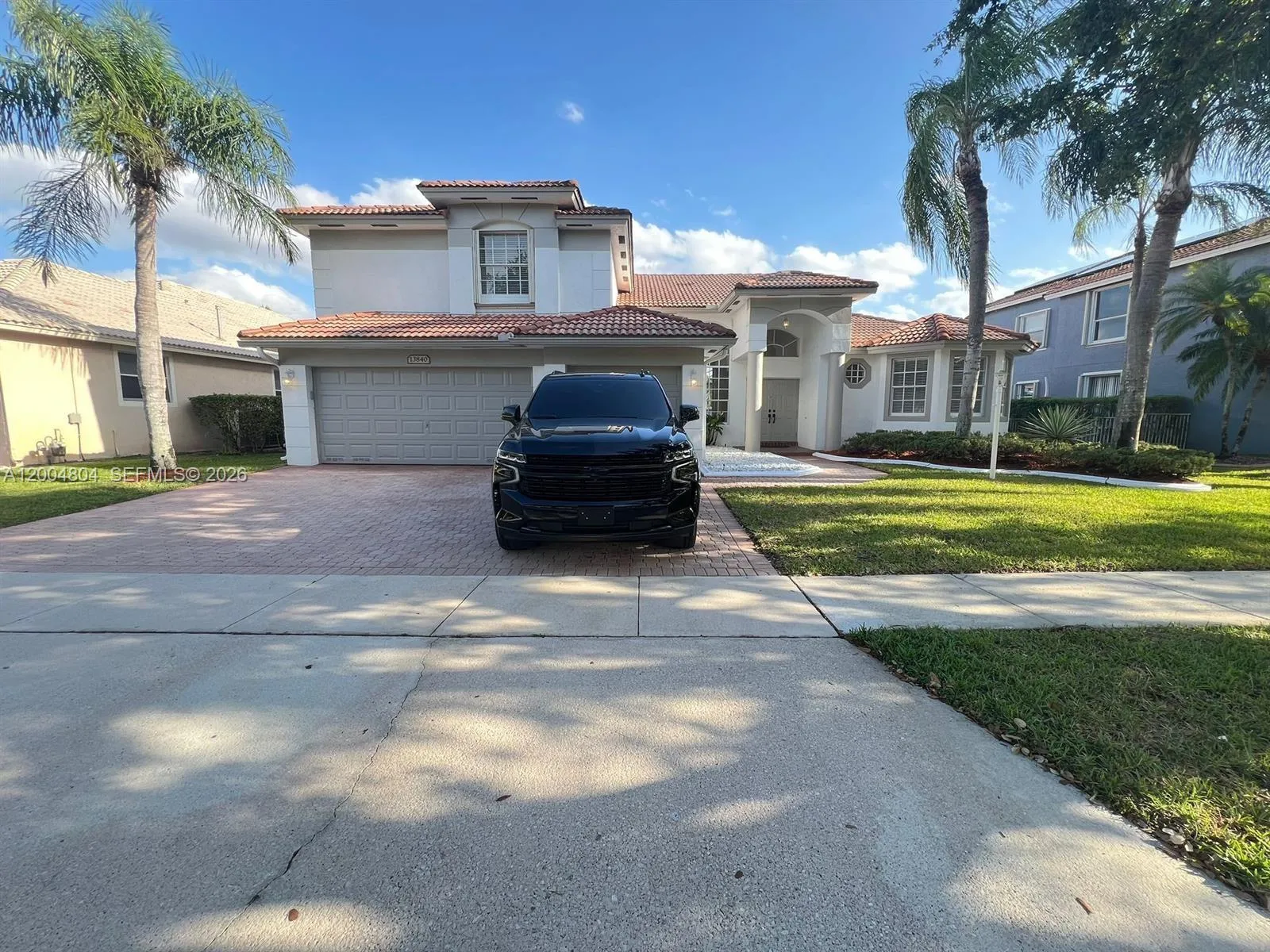 Foto de propiedad en 13840 NW 20th Street, Pembroke Pines, FL 33028 Pembroke Pines con MLS# 