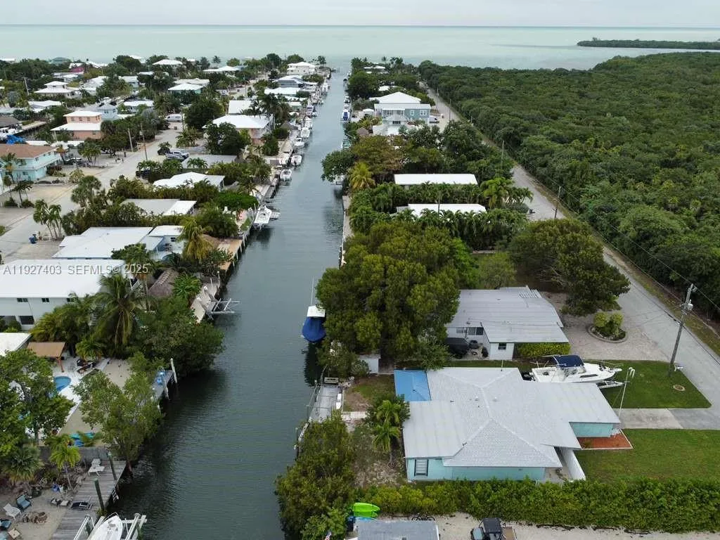 Foto de propiedad en 1403 Grouper Drive, Marathon, FL 33050 Marathon con MLS# 