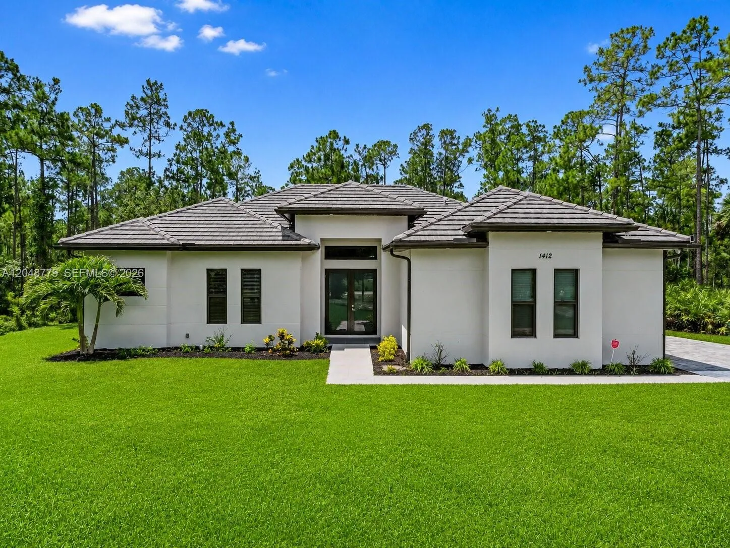 Foto de propiedad en 1412 22nd Avenue NE, Naples, FL 34120 Naples con MLS# 
