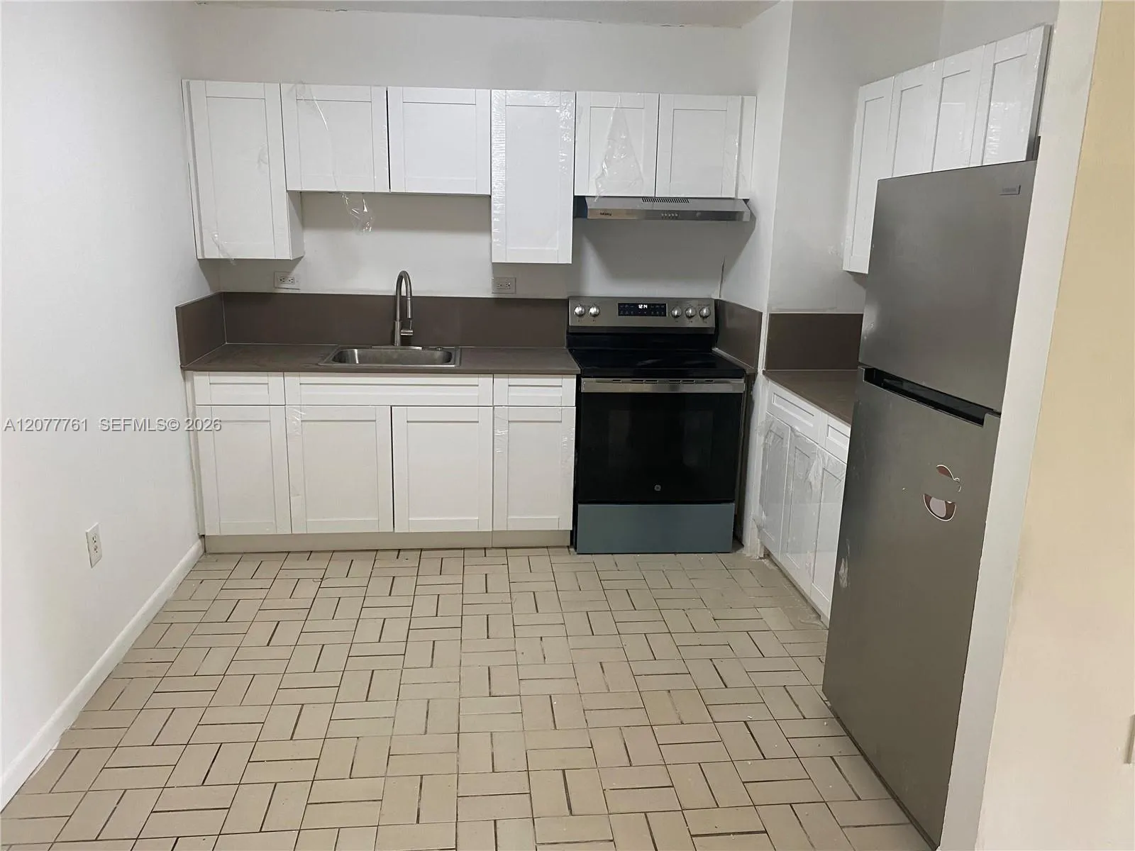 Foto de propiedad en 1415 NE 118th Terrace 1421, Miami, FL 33161 Miami con MLS# 